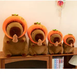 Cute capybara plush toy doll wearing orange hat holding peanut, soft stuffed animal gift detail.