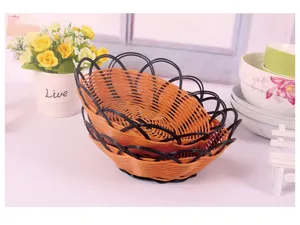 Cesta de almacenamiento de ratan sintetico detalle, frutero tejido apilado para uso domestico.