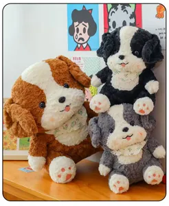 Detailed view of cute plush border collie puppy toys with lovely paws and decorative scarves.