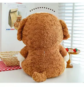 Detailed back view of cute brown curly plush puppy toy, soft texture and cozy room display.