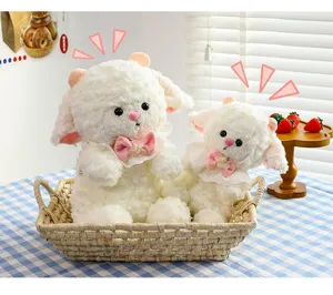 Cute plush sheep toy with pink bow and lace collar, soft stuffed lamb doll for kids gift.