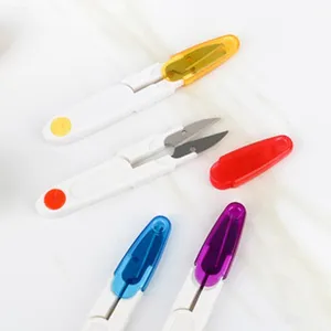 Colorful U-shaped yarn scissors with protective caps, ideal for sewing and thread cutting.