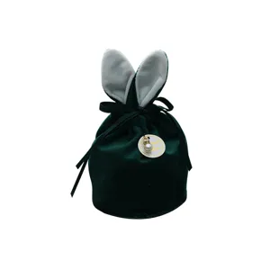 Green velvet bunny ear candy bag for wedding favors, cute gift pouch with pearl pendant.