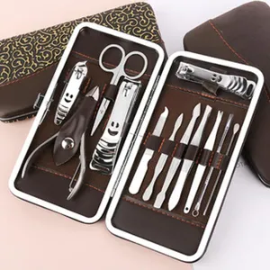 Stainless steel manicure set portable nail clipper grooming tool kit with premium brown leather case.