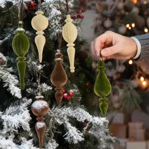 Set of 6 flocked Christmas ornaments in teardrop shapes for festive tree decoration.