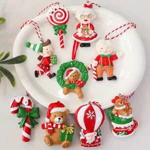 Set of assorted festive resin Christmas tree ornaments including Santa and candy canes