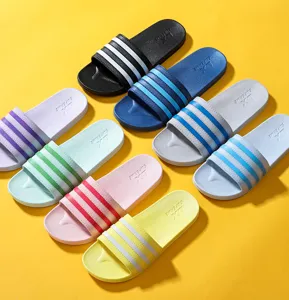 Colorful slide sandals with three-stripe design for home bathroom and indoor daily wear.