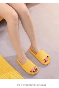 Comfortable yellow slide sandals for women, thick sole anti-slip summer indoor home slippers.
