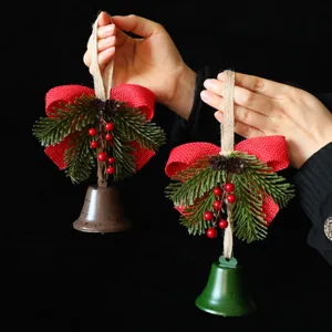 Nordic style Christmas tree bell ornaments with red burlap bow and pine needles