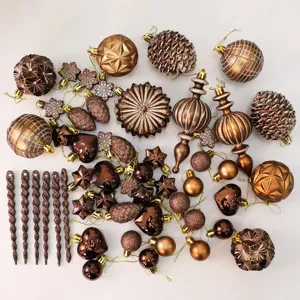 Set di decorazioni natalizie in bronzo con palline testurizzate, stelle e ghiaccioli.