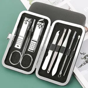 Stainless steel manicure set professional nail clipper kit with portable travel leather case.