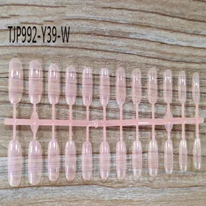 Clear pink false nail tips display set for nail art practice and salon use detail view.