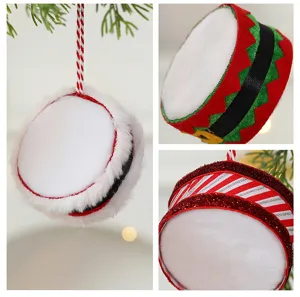 Detailed views of festive fabric Christmas drum ornaments with soft plush and glitter details
