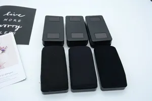 Black magnetic whiteboard eraser with durable fabric surface for office and school teaching use.
