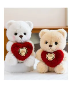 Stuffed plush bear toy detail view, cute animal doll with red heart pillow, soft and fluffy texture.