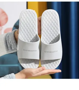 Comfortable grey indoor slippers with wave texture anti-slip sole for bathroom home daily use.