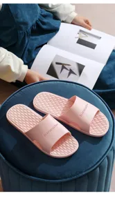 Pink home slippers with soft anti-slip sole and stylish print for indoor bathroom and daily use.