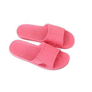Comfortable pink indoor slip-on slippers, non-slip shower sandals for home daily wear.