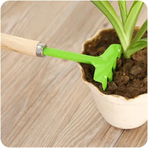 Petit râteau de jardin avec manche en bois pour plantes en pot outil manuel vert