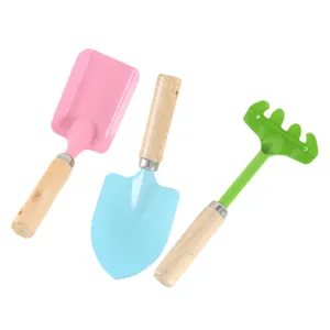 Kit d'outils de jardinage miniature avec pelle et râteau en bois pour plantes en pot.