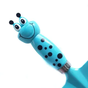 Close-up detail of children gardening tool cute blue cartoon bug handle with black spots.
