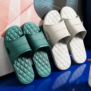 Comfortable couple home slippers with diamond pattern design, soft non-slip sole, green and white.