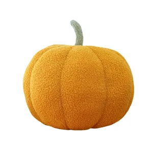 Cute orange plush pumpkin pillow soft stuffed cushion for sofa decoration.