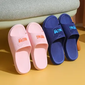 Comfortable couple home slippers with soft anti-slip soles, cute bear design for indoor use.