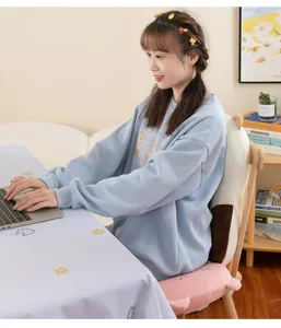 Detail view of a cute cartoon chair cushion set with ear design, comfortable office seat pad.