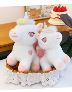 Graziosa coppia di peluche unicorno arcobaleno con ali e cestino di pizzo, morbido.