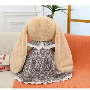 Cute long-eared rabbit plush toy wearing a floral dress, soft companion doll gift for girls.