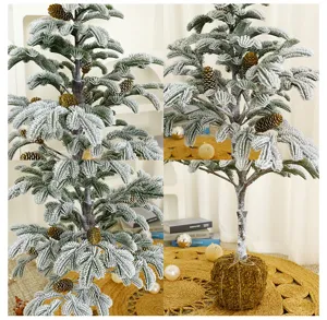 Detailed views of a flocked Christmas tree featuring pine cones and a natural moss base