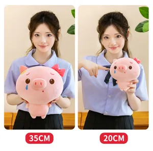 Detailed view of the cute pink crying pig plush toy, showing 35cm and 20cm size comparison.