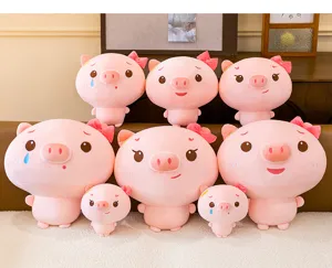 Detailed view of cute pink pig plush toys set, soft stuffed doll with bow, perfect birthday gift.