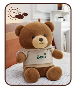 Cute brown plush teddy bear toy wearing a beige hoodie, soft sleeping pillow gift for girls.