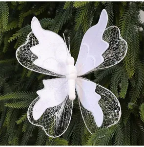 Close-up of white glitter cloth butterfly Christmas tree ornament with mesh wings