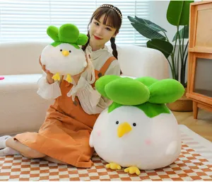 Cute garlic bird plush toy detail showing soft white body and green leaf head design.