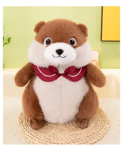 Detailed view of cute marmot plush toy with red collar, soft fabric plush doll ornament.