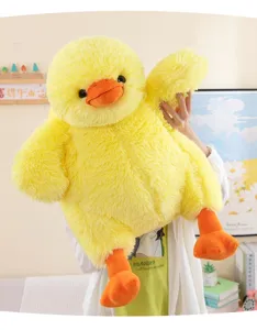Cute fluffy yellow duck plush toy, soft stuffed animal doll sleeping pillow for kids and gift.