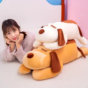Cute sleeping plush dog pillow toy, soft stuffed animal doll for girls bed hug decoration.