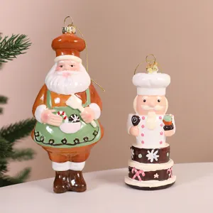 Close-up view of Santa Claus chef and nutcracker baker Christmas tree hanging ornaments
