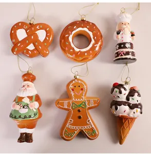 Collection of assorted Christmas gingerbread and food ornaments for holiday tree decoration.