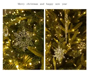 Close-up view of clear crystal snowflake and icicle hanging decorations on a glowing Christmas tree