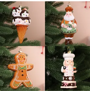 Festive assorted Christmas tree hanging ornaments with gingerbread man and Santa Claus