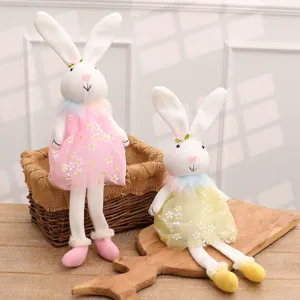 Pair of plush Easter bunnies in floral daisy dresses for holiday home decoration and gifts