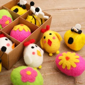 Handmade wool felt Easter hanging ornaments featuring cute chicks, bees, and colorful floral eggs.