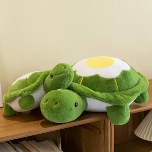 Cute green turtle plush toy with fried egg shell design, soft pillow doll, birthday gift for kids.