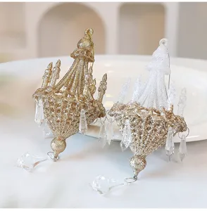 Gold and white glitter chandelier Christmas ornaments with crystal pendants detail view