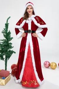 Detailansicht des roten Samt Weihnachtskostüms mit plüschigem weißem Kunstfellbesatz und Golddruck.