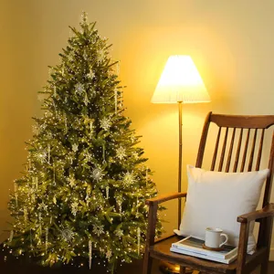 Large Christmas tree with crystal ornaments and warm fairy lights in cozy home setting